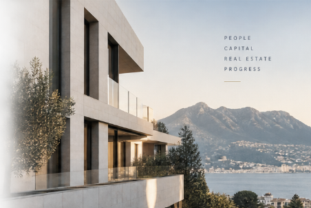 Modern European real estate overlooking a mountain landscape